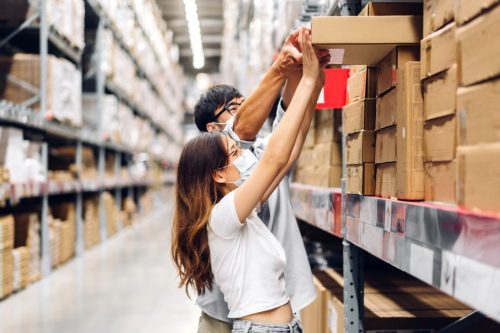 Asian two engineer team shipping order detail on tablet check go